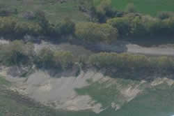 gravel deposited on paddocks near the Motupiko River.
